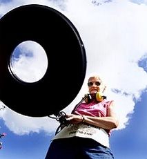 Seen in this treasure?s-eye view with her prized underwater metal detector, Eleanor Hube may not seem so imposing. But she?s known as a master finder ? if the sand can swallow it, she can most likely dig it out.